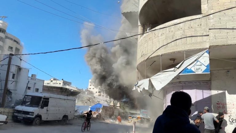 An explosion is seen during an Israeli strike, in Gaza City