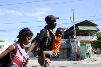 Residents flee their neighbourhood due to gang violence, in Port-au-Prince