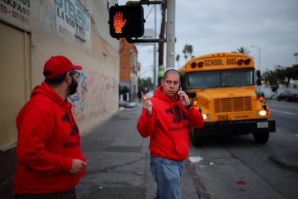 Immigrant rights advocacy volunteers patrol streets for ICE activity in Los Angeles