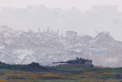 General view of destroyed buildings in Gaza, as seen from the Israel-Gaza border