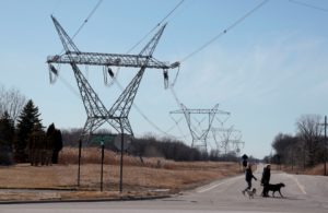 High-voltage transmission towers that carry electricity across the St. Clair River between Canada and the United States ar...
