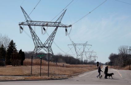 High-voltage transmission towers that carry electricity across the St. Clair River between Canada and the United States ar...