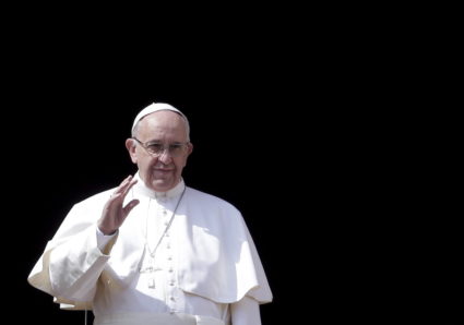 Pope Francis delivers the Urbi et Orbi benediction at the end of the Easter Mass in Saint Peter's Square at the Vatican
