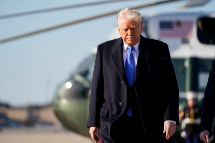 U.S. President Donald Trump boards Air Force One as he departs for New Jersey at Joint Base Andrews