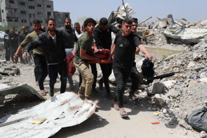 Israeli strikes on Gaza kill at least 100, including many sheltering at school, Palestinian health officials say