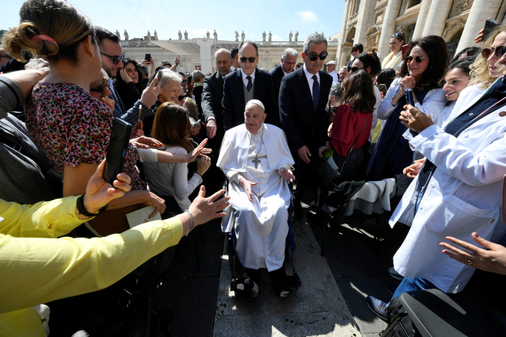 Pope Francis appears for the first time since his return to the Vatican