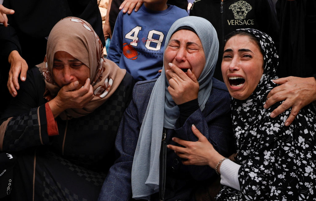Palestinians mourn loved ones killed in Israeli strikes