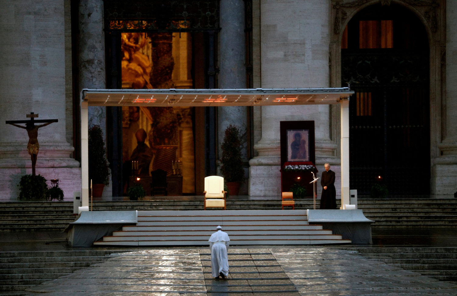 FILE PHOTO: Pope Francis delivers an extraordinary blessing from St. Peter's Square during the outbreak of coronavirus dis...