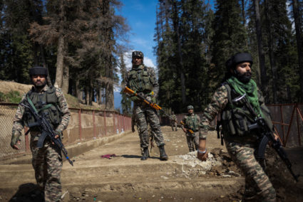 Indian security personnel at the site of the attack in Baisaran near Pahalgam