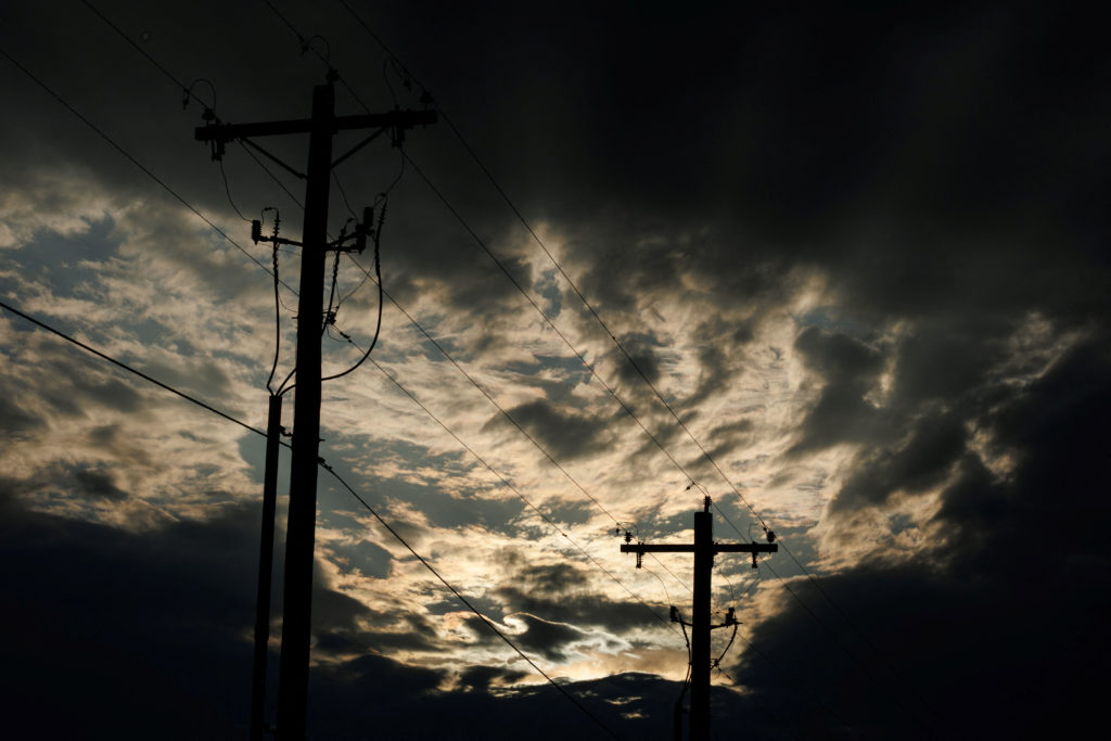 Electrical power lines are shown in Texas during a storm