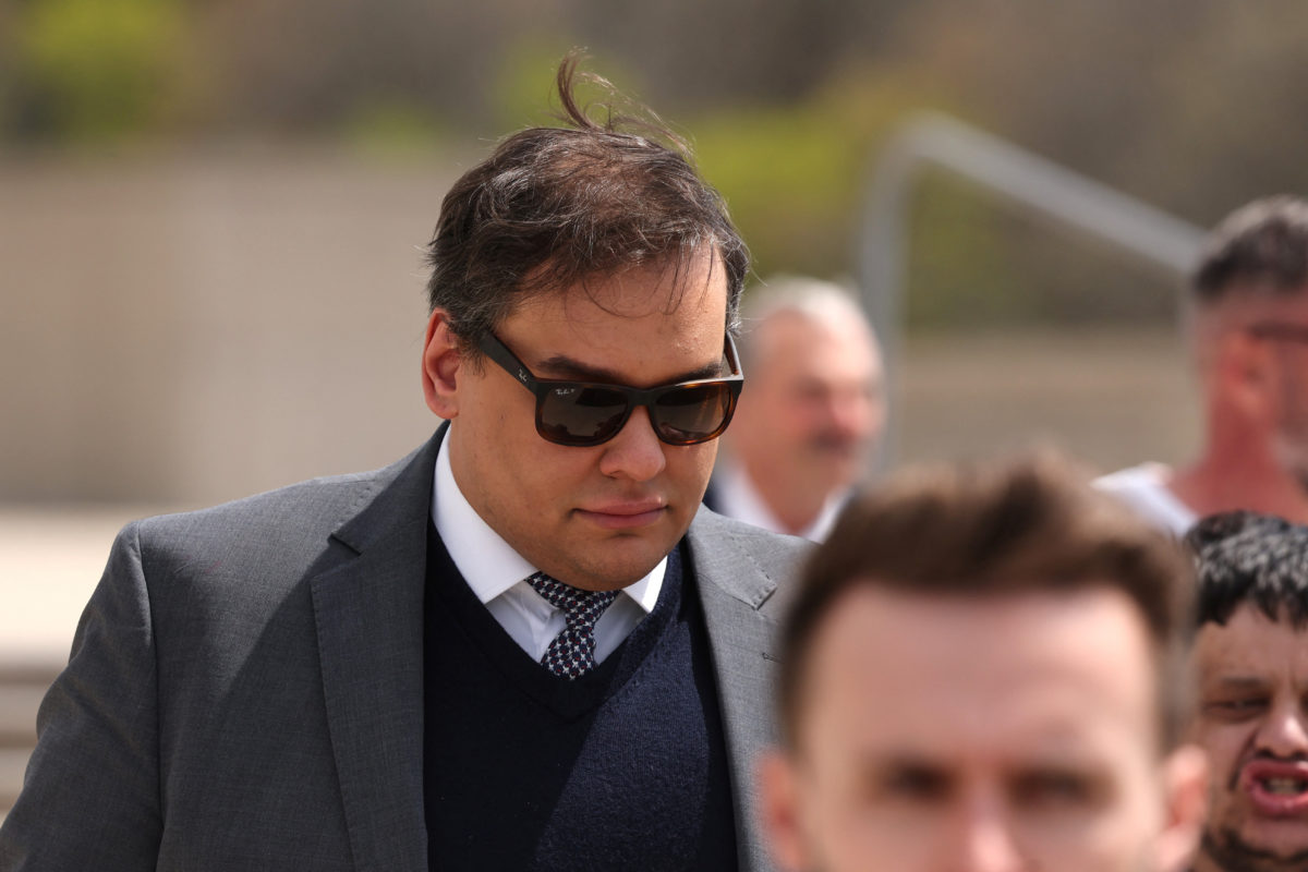 ExUS Rep. Santos sobbed as sentenced to over 7 years in prison