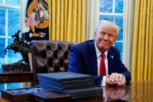 U.S. President Donald Trump reacts at the White House