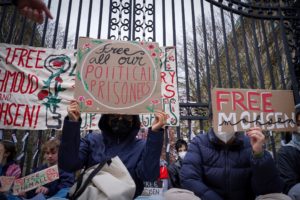 Students and others demonstrate during a protest outside the gates to Columbia University in New York