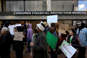 FILE PHOTO: CFPB supporters rally in Washington
