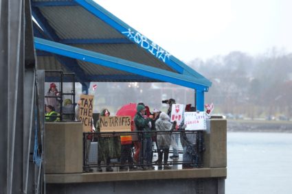 People protest in solidarity with Canada over tariffs, in Buffalo, New York