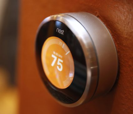 A Nest thermostat is installed in a home in Provo