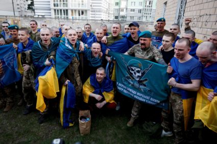 Ukrainian prisoners of war (POWs) return after a swap, at an undisclosed location