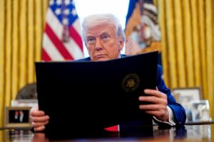 U.S. President Donald Trump signs executive orders at the White House