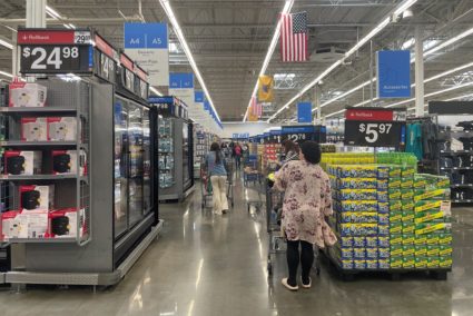 Shoppers browse a Walmart Supercenter a day after U.S. President Donald Trump announced new tariffs, in Secaucus