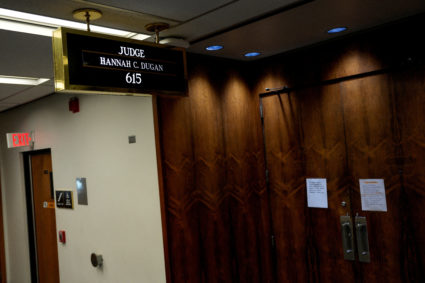 Wisconsin judge says no legal basis to charge her with helping man evade immigration agents