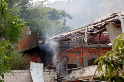 Smoke rises from Bilal Mosque after it was hit by an Indian strike in Muzaffarabad