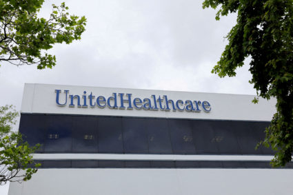 FILE PHOTO: The corporate logo of the UnitedHealth Group appears on the side of one of their office buildings in Santa Ana...