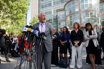 Judge reduces Menendez brothers' murder sentences, making them eligible for parole