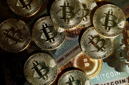 FILE PHOTO: FILE PHOTO: Illustration shows representations of cryptocurrency Bitcoin