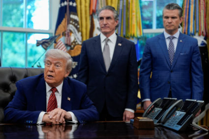 U.S. President Donald Trump signs executive orders at the White House in Washington