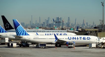 FILE PHOTO: United Airlines planes land and prepare to take off at Newark Liberty International Airport in Newark