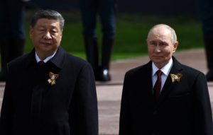 Leaders lay flowers during a ceremony on Victory Day in central Moscow