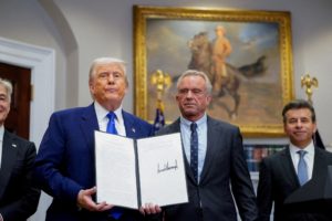 FILE PHOTO: U.S. President Trump and U.S. Health and Human Services (HHS) Secretary Kennedy attend a press conference, in ...