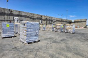 Boxes of aid are seen at the Kerem Shalom crossing between Israel and Gaza, on its Israeli side