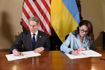 News Wrap: U.S. and Ukraine sign minerals deal