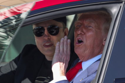 U.S. President Donald Trump views a Tesla car at the White House in Washington