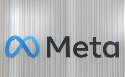 FILE PHOTO: The logo of Meta is seen at the entrance of the company's temporary stand ahead of WEF in Davos