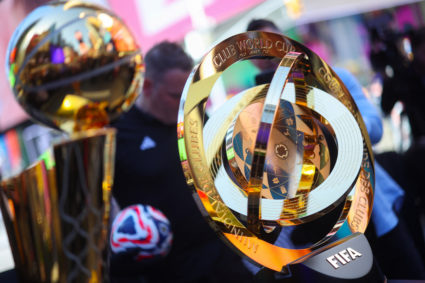 2025 NBA Champion Larry O'Brien Trophy and FIFA Club World Cup 2025 winners trophy are displayed in Times Square in New Yo...