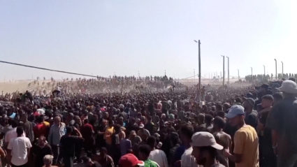 Palestinians rush to get aid boxes, in Rafah