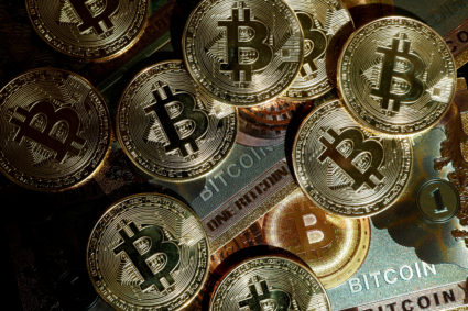 FILE PHOTO: Illustration shows representations of cryptocurrency bitcoin