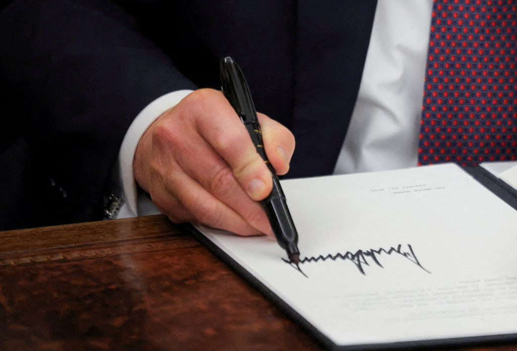 FILE PHOTO: U.S. President Donald Trump at the Oval Office in Washington