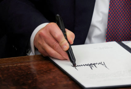 FILE PHOTO: U.S. President Donald Trump at the Oval Office in Washington