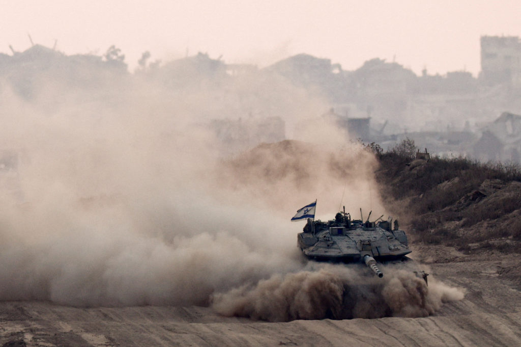 Israeli military vehicles manoeuvre in Gaza