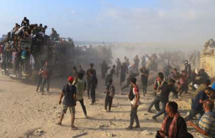 Palestinian health authorities say Israel kills 44 waiting for aid as war death toll tops 56,000