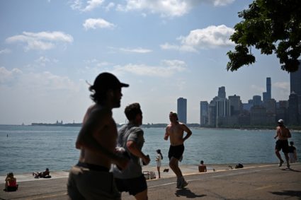 People jog along the front in Chicago