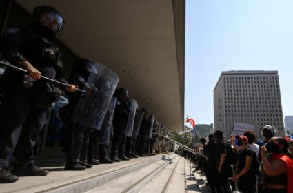 FILE PHOTO: California National Guard troops stand outside the Edward R. Roybal Federal Building, in Los Angeles