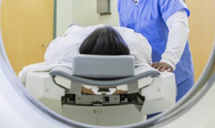 African-American woman getting a CT scan