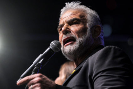 Israel's opposition leader rallies behind Iran operation, after months of criticizing Netanyahu