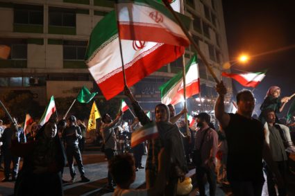 Iranians celebrate following Iran's attack on U.S. military base in Qatar, amid the Iran-Israel conflict, in Tehran