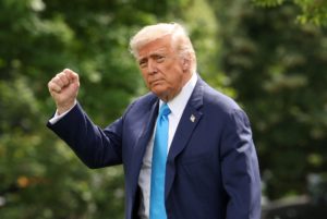 U.S. President Donald Trump departs the White House in Washington