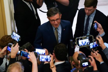 U.S. House Speaker Johnson (R-LA) speaks to reporters before departing for the White House, in Washington